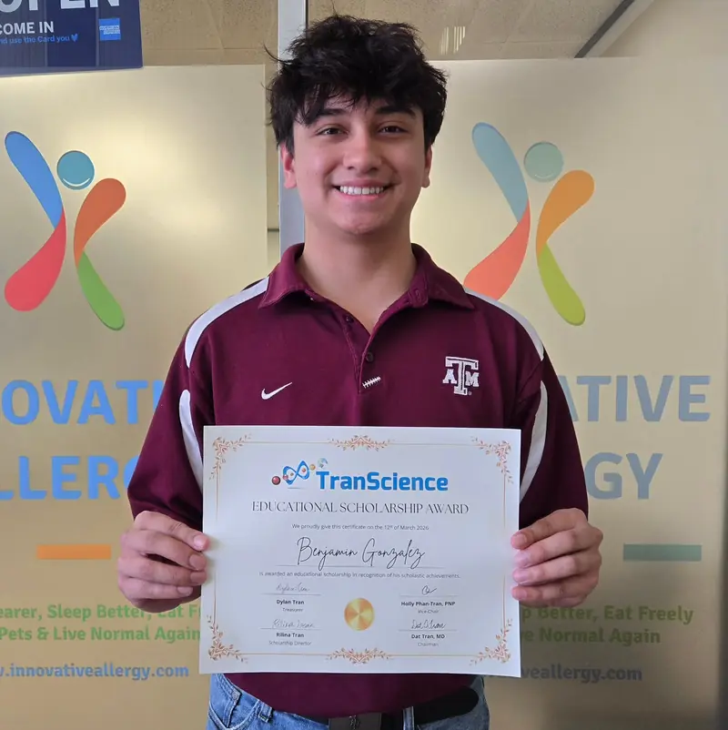 Benjamin Gonzalez with his certificate