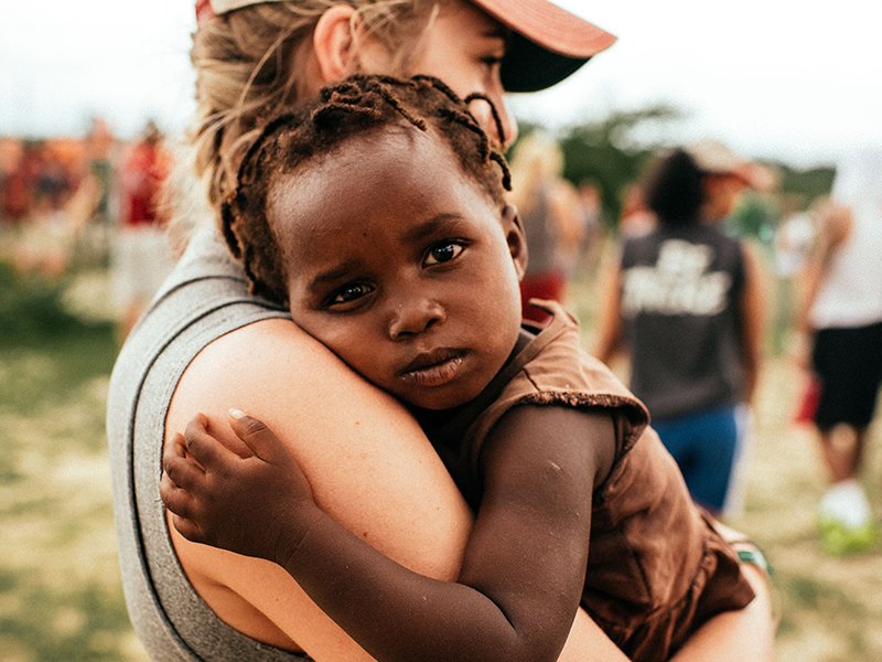 Person Holding a Child 1 Person Holding a Child 1